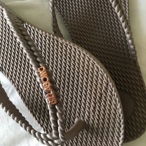 Brown flip flops